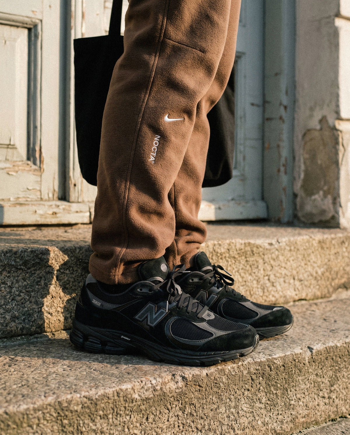 New Balance 2002R Black Dark Grey - on foot